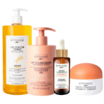 L'image montre quatre produits de soin Byphasse : un grand flacon de gel douche micellaire à l'argan, un grand flacon de lotion corporelle blanchissante, un petit sérum à la vitamine C et un pot de crème à la vitamine C. Tous les produits sont disposés en rangée. Dakar