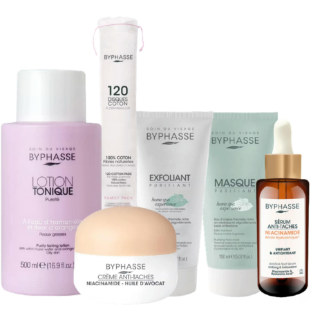Une collection de soins Byphasse comprenant une lotion tonique, un exfoliant, un masque visage, une crème hydratante, un sérum et un paquet de 120 cotons. Les produits arborent un packaging aux couleurs pastel et un étiquetage clair. Dakar