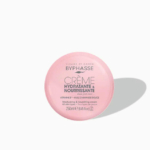 Un pot rond rose de crème hydratante et nourrissante Byphasse pour le visage et le corps. Le texte « Crème Hydratante & Nourrissante » mentionne la vitamine F et l'huile d'amande douce. Le pot projette une ombre sur un fond blanc. Dakar
