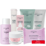 Une collection de produits de soin Byphasse, comprenant une lotion, des disques de coton, une crème hydratante, un masque purifiant, un exfoliant, des lingettes nettoyantes et une crème, présentée sur fond blanc. Une étiquette rouge indique « Pack Visage ». Dakar