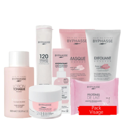 Une collection de produits de soin Byphasse, comprenant une lotion, des disques de coton, un masque visage, un exfoliant, une crème hydratante et des lingettes démaquillantes. L'emballage est principalement rose et blanc. Une étiquette rouge en bas à droite indique « Pack Visage ». Dakar