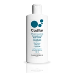 Un flacon blanc de 150 ml étiqueté CaditarShampoing Complément Anti-chute présente des cercles bleus et un texte français soulignant les bienfaits du renforcement et de la stimulation. Dakar