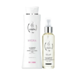Deux produits cosmétiques sont présentés sur fond blanc : un grand flacon blanc étiqueté « Hydra, Lait Hydratant Raffermissant » et un flacon transparent muni d'une pompe étiqueté « Éclat, Huile Nourrissante Éclaircissante ». Tous deux arborent le logo Candes. Dakar