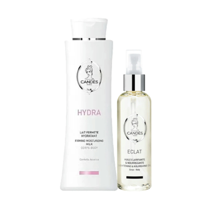 Deux produits cosmétiques sont présentés sur fond blanc : un grand flacon blanc étiqueté « Hydra, Lait Hydratant Raffermissant » et un flacon transparent muni d'une pompe étiqueté « Éclat, Huile Nourrissante Éclaircissante ». Tous deux arborent le logo Candes. Dakar