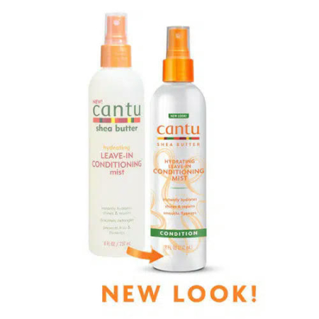 Deux flacons de brume revitalisante sans rinçage au beurre de karité Cantu sont présentés. Le flacon de gauche arbore un design sobre, tandis que celui de droite arbore un design plus dynamique et revisité. Le texte en dessous indique « NOUVEAU LOOK ! » avec une flèche pointant vers le flacon repensé. Dakar