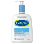 Un flacon de 470 ml de nettoyant doux Cetaphil avec pompe bleue. L'étiquette porte le logo Cetaphil et les informations produit en plusieurs langues, indiquant qu'il convient aux peaux normales, sèches et sensibles. Dakar
