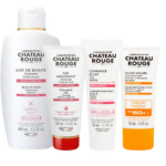 Quatre soins du Laboratoire Château Rouge présentés côte à côte. La gamme comprend le Lait de Beauté (400 ml), le Gel Moussant (200 ml), le Gommage Éclat (50 ml) et le Fluide Solaire Protecteur (50 ml) avec SPF 50+. Chaque produit est doté d'une étiquette blanche et rouge. Dakar