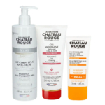 Trois soins du Laboratoire Château Rouge : un lait corps éclat anti-taches, un gel nettoyant moussant et un fluide protecteur solaire SPF 50+. Ils sont présentés côte à côte dans des packagings blancs et orange. Dakar