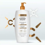 Un grand flacon blanc avec une pompe orange, étiqueté « Laboratoire Château Rouge ». Il présente un lait de beauté à la vitamine C en édition limitée. Le flacon contient 750 ml (25,3 fl oz). Des éléments orange et blancs entourent le flacon. Dakar