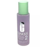 Un flacon de Lotion Clarifiante Clinique 2 pour peaux mixtes. Le flacon est couleur lavande avec un bouchon vert et un texte blanc. Il contient 200 ml de produit. Dakar