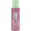 Un flacon rose de Clinique Clarifying Lotion 3, un exfoliant deux fois par jour pour les peaux mixtes à grasses. Son bouchon est vert et l'inscription indique 200 ml. Dakar