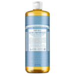 Flacon transparent de savon naturel 18 en 1 Dr. Bronner's Baby-Mild, avec étiquette bleue. L'étiquette présente une description des ingrédients et des utilisations, soulignant ainsi sa formule douce. Le flacon contient 945 ml de savon liquide. Dakar