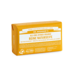 Un pain rectangulaire de savon magique tout-en-un Dr. Bronner's, présenté dans un emballage aux tons citron-orange. L'étiquette met en avant des ingrédients biologiques comme les huiles de coco et d'olive. Certifié commerce équitable, il pèse 140 g. Dakar