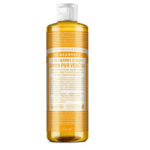 Un flacon de 475 ml de savon liquide pur de Castille Dr. Bronner's aux agrumes et à l'orange. De forme cylindrique, le flacon est muni d'un bouchon blanc et d'une étiquette orange avec des informations en français et en anglais sur ses utilisations et ses ingrédients. Dakar