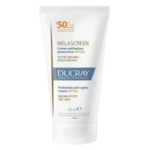 Tube blanc de crème Ducray Melascreen, avec SPF 50+. L'étiquette indique qu'il s'agit d'une crème protectrice anti-taches, adaptée aux taches brunes et aux peaux sèches. Le tube contient 50 ml. Dakar