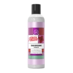 Un flacon de shampoing Easy Pouss Kigelia, orné d'une étiquette colorée à motifs géométriques et d'une fleur d'hibiscus. Il est accompagné de mentions sur les propriétés anti-chute, sans silicone et sans sulfate. Dakar