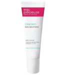 Un tube blanc de soin SOS Boutons Eau Précieuse Clearskin pour peaux à tendance acnéique. Son emballage est orné de détails sur le produit en français, en rose et vert, conçu pour cibler les boutons pendant la nuit. Dakar