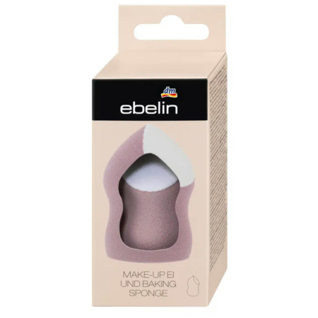 Emballage d'une éponge à maquillage et à pâtisserie Ebelin. La boîte beige présente une découpe laissant apparaître une éponge marron à l'intérieur. L'inscription « MAKE-UP EI UND BAKING SPONGE » figure sur le devant. Dakar