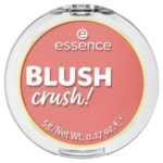 Un poudrier rond Essence Blush Crush dans un étui transparent. Le blush est d'un rose doux. Sur le couvercle, on peut lire « essence BLUSH crush ! » et « 5 g/poids net ». Dakar