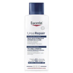 Un flacon blanc de Lotion Réparatrice à l'Urée Eucerin avec un bouchon bleu. L'étiquette présente un texte en français et en néerlandais, soulignant les propriétés hydratantes intenses de sa formule à 10 % d'urée pour les peaux très sèches, ainsi qu'une promesse d'hydratation 72 heures. Dakar