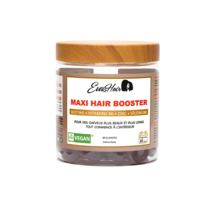 Un pot de gommes EvaHair Maxi Hair Booster avec un couvercle en bois. L'étiquette indique les ingrédients : biotine, vitamine B6, zinc et sélénium, et mentionne le produit végétalien. Le pot contient 60 gommes au goût framboise. Le texte en français est également visible. Dakar