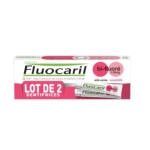 L'image montre une boîte de dentifrice Fluocaril, plus précisément bi-fluoré 145 mg, conçu pour prévenir les caries et la sensibilité. L'emballage comprend deux tubes et est étiqueté en français. Dakar