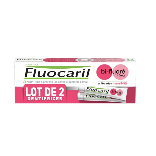 L'image montre une boîte de dentifrice Fluocaril, plus précisément bi-fluoré 145 mg, conçu pour prévenir les caries et la sensibilité. L'emballage comprend deux tubes et est étiqueté en français. Dakar