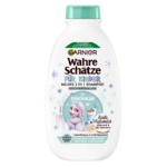 Un flacon blanc de Garnier Wahre Schätze pour enfants, orné du logo « Eiskönigin » avec les personnages d'Elsa et d'Olaf. Ce shampoing doux 2 en 1 est réputé doux pour les yeux. Son bouchon est vert et orné de flocons de neige. Dakar