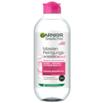 Un flacon en plastique transparent d'Eau Micellaire Nettoyante Garnier SkinActive. L'étiquette est en allemand, avec des touches de rose et des informations détaillées sur les propriétés nettoyantes et démaquillantes du produit, adapté aux peaux sèches et sensibles. Dakar