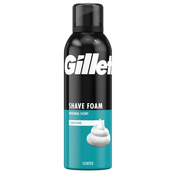 Une bombe de mousse à raser Gillette pour peaux sensibles au parfum original. Son bouchon est noir, sa partie supérieure est ornée du logo Gillette et sa partie inférieure est bleu sarcelle, ornée d'un motif mousse blanc. Dakar