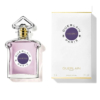 Un flacon de parfum Guerlain Insolence, au liquide rose et au bouchon argenté orné, est placé à côté de son emballage blanc. L'emballage arbore le nom et le logo de la marque, avec un motif circulaire violet au centre. Dakar