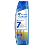Un flacon bleu et transparent de shampoing antipelliculaire Head & Shoulders Pro-Expert. L'étiquette met en avant ses bienfaits anti-chute, enrichi en caféine, et arbore le logo « 7 bienfaits ». Dakar