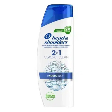 Un flacon bleu et blanc de shampoing et après-shampoing 2-en-1 Classic Clean de Head & Shoulders, étiqueté pour un usage quotidien et antipelliculaire. L'emballage souligne qu'il offre une protection antipelliculaire jusqu'à 100 %. Dakar