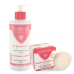 Un flacon de lotion blanchissante Topsygel à côté d'une boîte et d'un pain de savon éclaircissant Topsygel. Ces produits, étiquetés pour unifier et éclaircir le teint, sont enrichis en glycérine et en aloe vera et conçus pour une utilisation sur le visage et le corps. Dakar