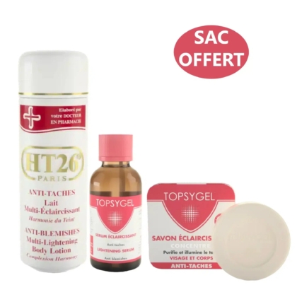 L'image présente trois produits de soin HT26 Paris : un lait corps multi-éclaircissant anti-imperfections, un sérum éclaircissant et un savon rond, tous conçus pour le traitement anti-taches. Une étiquette rouge indique « SAC OFFERT ». Dakar
