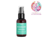 Un flacon ambré foncé d'« Huile Miracle In Haircare » avec une étiquette turquoise et un bouchon vaporisateur noir. L'étiquette indique « Fortifie et nourrit » en français. Le logo du prix figure en haut à droite, mettant en valeur « NHAPrizes2023 ». Dakar