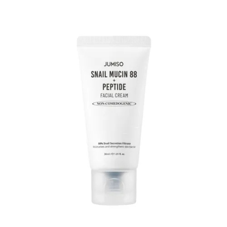 Tube blanc de crème visage Jumiso à la mucine d'escargot 88 + peptides. L'étiquette précise qu'elle est non comédogène, contient 30 ml de produit et contient 88 % de filtrat de bave d'escargot. Dakar