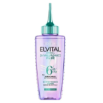 Un flacon violet de L'Oréal Elvital Hydra [Hyaluronique] Pure avec un embout vert. L'étiquette présente un complexe pur à 6 % avec de l'acide salicylique, conçu pour nettoyer le cuir chevelu. Le flacon est de 200 ml. Dakar