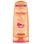 Un flacon d'après-shampoing L'Oréal Paris Elvital Dream Length Super Aufbau Spülung, sur fond orange avec des touches de rose et d'orange. Le texte met en avant les protéines végétales, les vitamines et l'huile de ricin pour les cheveux longs et abîmés. Dakar