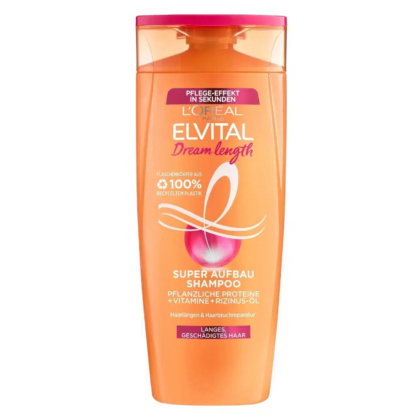 Un flacon orange de shampoing L'Oréal Elvital Dream Length, doté d'un bouchon rose à clapet. L'étiquette mentionne les protéines végétales, les vitamines et l'huile de ricin, pour une action réparatrice sur les cheveux longs et abîmés. Dakar