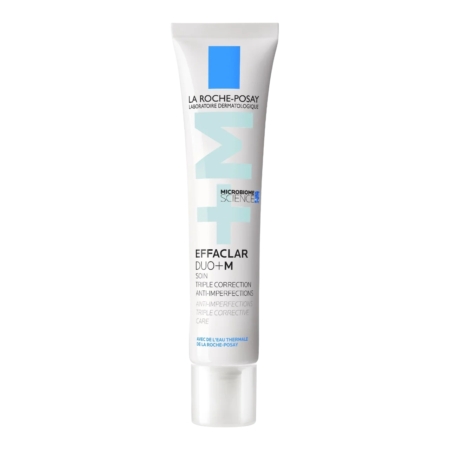Un tube blanc de La Roche-Posay Effaclar Duo+ M, présenté comme un soin solaire triple correction anti-imperfections. Le tube arbore un logo bleu et blanc, ainsi qu'un texte détaillant ses propriétés correctrices. Dakar