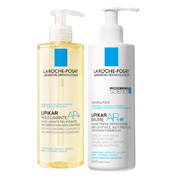 Deux produits de soin La Roche-Posay : un flacon pompe transparent « Huile Lavante AP+ » et un flacon pompe blanc « Baume AP+M ». Les deux flacons contiennent des informations détaillées sur le produit et sont conçus pour les peaux sensibles et sujettes à l'eczéma. Dakar