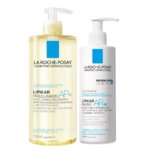 Deux produits de soin La Roche-Posay. À gauche, une huile démaquillante teintée jaune dans un flacon pompe étiqueté « Lipikar Huile Lavante AP+ ». À droite, un flacon pompe blanc de baume hydratant étiqueté « Lipikar Baume AP+M ». Dakar