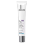 Un tube de La Roche-Posay Mela B3 SPF 30, contenant un soin correcteur anti-taches. Le tube blanc est orné d'un texte noir et violet détaillant ses bienfaits, notamment anti-taches et soin protecteur à la niacinamide et à la vitamine B3. Dakar