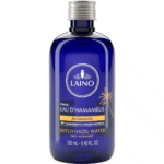 Un flacon bleu d'Eau d'Hamamélis Laino, présenté comme un astringent pour le visage. Le flacon de 250 ml (8,45 fl. oz) revendique 98 % d'ingrédients naturels. Dakar