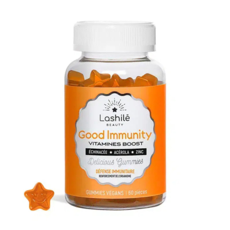 Une bouteille en plastique transparent étiquetée « Lashilé Beauty Good Immunity Vitamins Boost » contient des bonbons gélifiés orange en forme d'étoile. L'étiquette mentionne des ingrédients tels que l'échinacée, l'acérola et le zinc. La bouteille contient 60 bonbons gélifiés végétaliens. Dakar