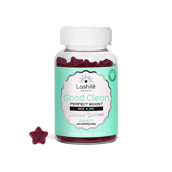 Un pot de bonbons gélifiés Lashilé Beauty Good Clean Perfect Boost est présenté. Le pot est orné d'une étiquette vert menthe indiquant qu'il est végan et contient 60 bonbons. Un bonbon gélifié en forme d'étoile est placé devant le pot. Dakar