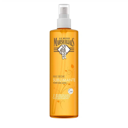 Un grand flacon vaporisateur orange contenant l'Huile Sèche Sublimante Le Petit Marseillais au beurre de karité, à l'amande douce et à l'huile d'argan. L'étiquette arbore un petit emblème noir et divers détails du produit en français. Dakar