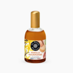 Un flacon d'eau de toilette Vanille Gourmande de Les Petits Plaisirs. L'étiquette est décorée de fleurs, de feuilles et de macarons de vanille. Le bouchon est doré et le parfum est ambré. Dakar