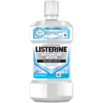 Un flacon de 250 ml de bain de bouche Listerine Advanced White au goût menthe verte. L'étiquette mentionne « Sans alcool » et « Goût doux », et mentionne qu'il aide à éliminer les taches tenaces pour des dents plus blanches en une semaine. Le flacon est recyclable. Dakar
